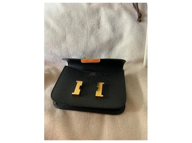Hermès Compacto delgado Constance Negro 