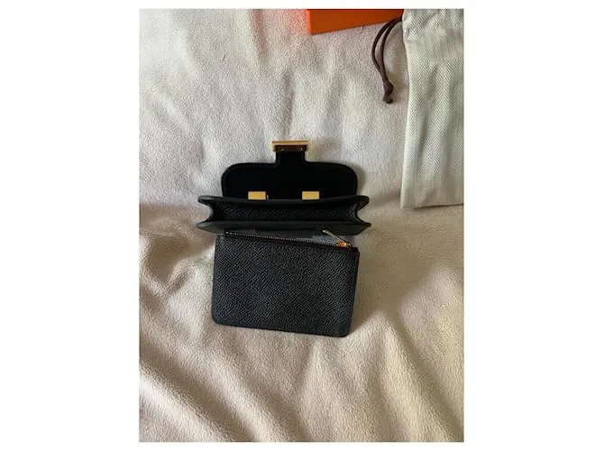 Hermès Compacto delgado Constance Negro 